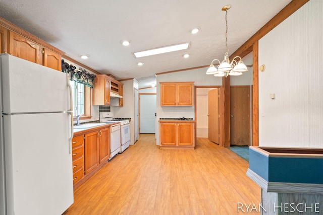 5886 W Clarksville Rd, Lake Odessa, MI 48849 - kitchen with white appliances, light wood-style flooring, a chandelier, crown molding, and pendant lighting