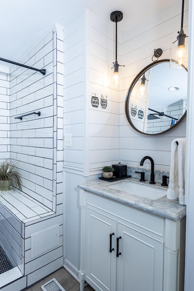22515 E 10 Mile Rd, Saint Clair Shores, MI 48080 - bathroom featuring vanity and tiled shower