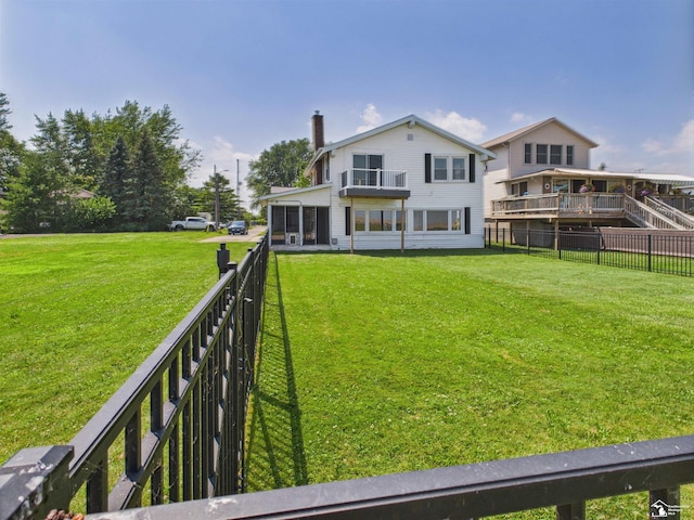 4356 14th St, Luna Pier, MI 48157 - back of property with a chimney and a fenced backyard