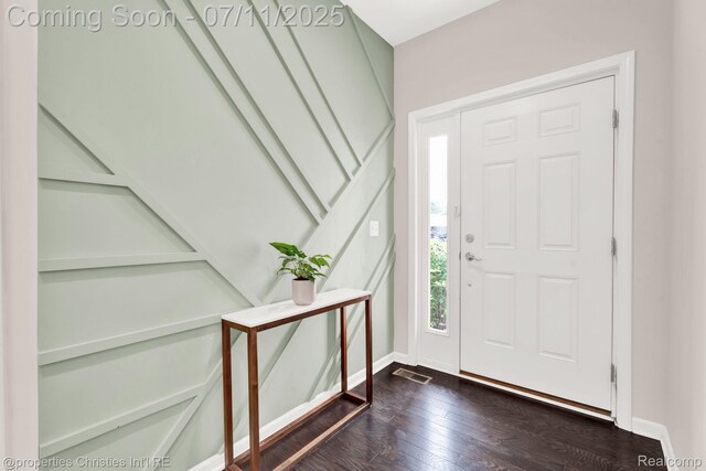 2962 Iowa Dr, Troy, MI 48083 - entrance foyer featuring dark wood finished floors and baseboards