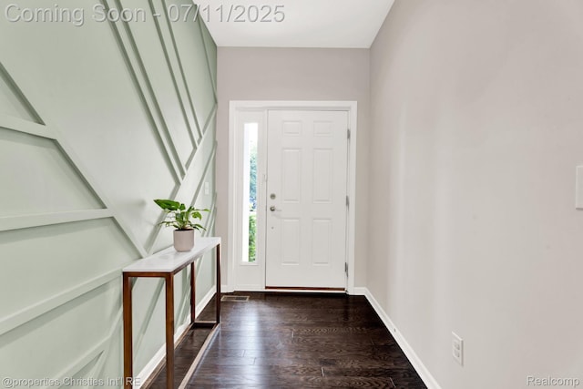 2962 Iowa Dr, Troy, MI 48083 - entryway featuring dark wood-type flooring and baseboards