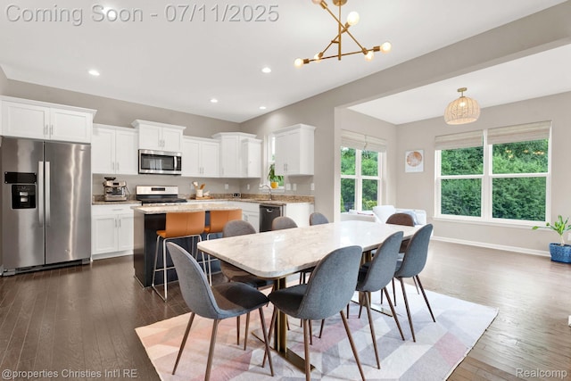 2962 Iowa Dr, Troy, MI 48083 - dining area featuring dark wood-style floors, a chandelier, and recessed lighting