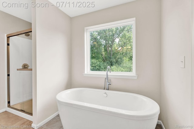 2962 Iowa Dr, Troy, MI 48083 - full bath with a shower stall, a freestanding tub, and tile patterned flooring