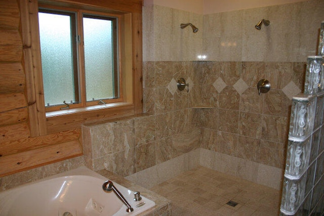 4231 Wildwood Ln, Moran, MI 49760 - bathroom featuring a bath and tiled shower