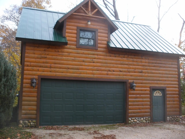 4231 Wildwood Ln, Moran, MI 49760 - garage featuring driveway
