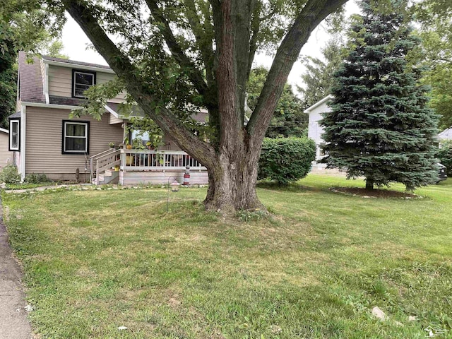 15427 Keegan Rd, Monroe, MI 48161 - view of green lawn with a wooden deck