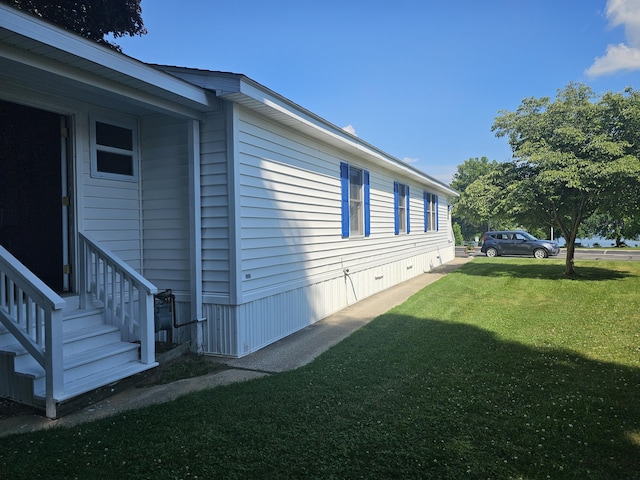 22460 Klines Resort Lot 117, Three Rivers, MI 49093 - view of home's exterior featuring a lawn