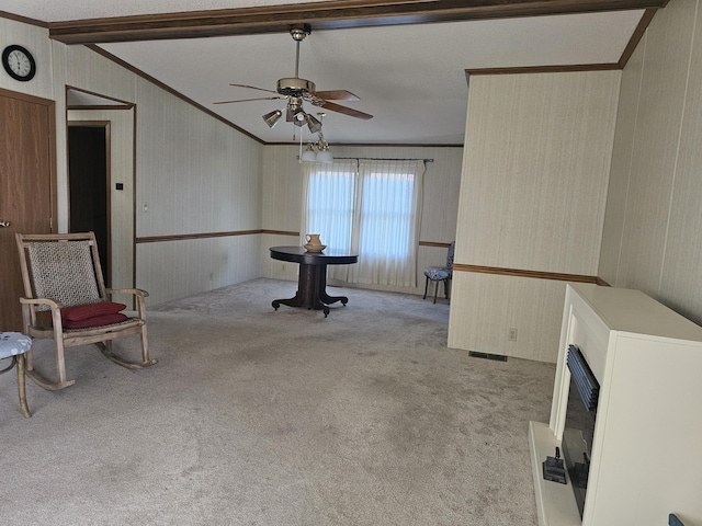 22460 Klines Resort Lot 117, Three Rivers, MI 49093 - unfurnished room with carpet flooring, crown molding, a ceiling fan, beamed ceiling, and wallpapered walls