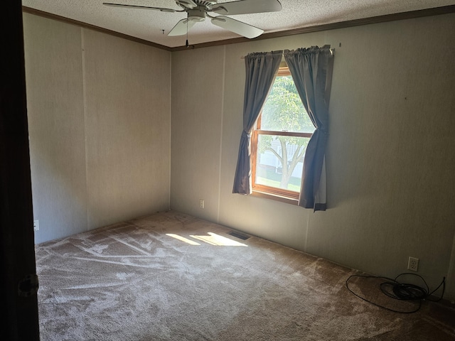 22460 Klines Resort Lot 117, Three Rivers, MI 49093 - carpeted spare room featuring a ceiling fan, a textured ceiling, and crown molding