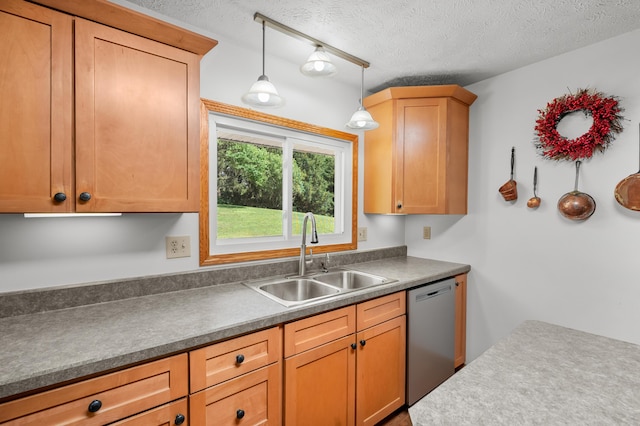 22100 N Uldriks Dr, Battle Creek, MI 49017 - kitchen with stainless steel dishwasher, a textured ceiling, hanging light fixtures, and dark countertops