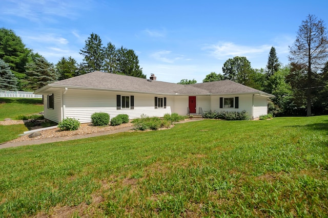 22100 N Uldriks Dr, Battle Creek, MI 49017 - ranch-style house featuring a front lawn and a chimney