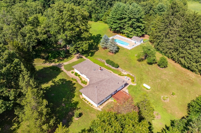 22100 N Uldriks Dr, Battle Creek, MI 49017 - view of subject property featuring a pool area and a forest