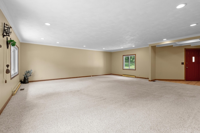 22100 N Uldriks Dr, Battle Creek, MI 49017 - spare room with recessed lighting, light carpet, crown molding, and a baseboard radiator