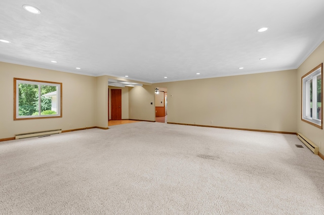 22100 N Uldriks Dr, Battle Creek, MI 49017 - unfurnished room with baseboard heating, recessed lighting, ornamental molding, light carpet, and a baseboard radiator