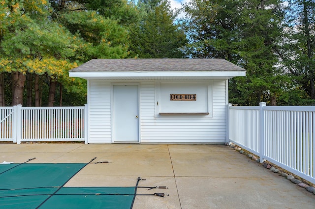 22100 N Uldriks Dr, Battle Creek, MI 49017 - view of patio featuring an outbuilding