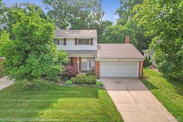 9157 Hackberry Ave, Plymouth, MI 48170 - traditional home featuring brick siding, a garage, driveway, and a front lawn