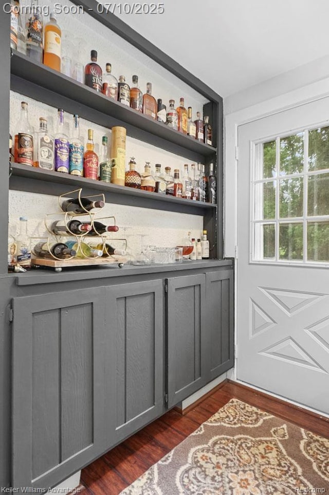 9157 Hackberry Ave, Plymouth, MI 48170 - indoor dry bar with dark wood-style floors