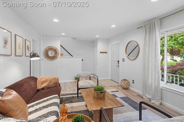 9157 Hackberry Ave, Plymouth, MI 48170 - living room featuring wood finished floors, recessed lighting, and stairway