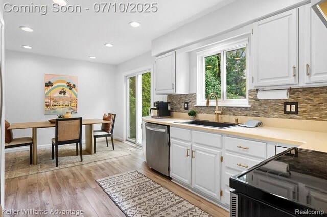 9157 Hackberry Ave, Plymouth, MI 48170 - kitchen with dishwasher, decorative backsplash, white cabinetry, and recessed lighting