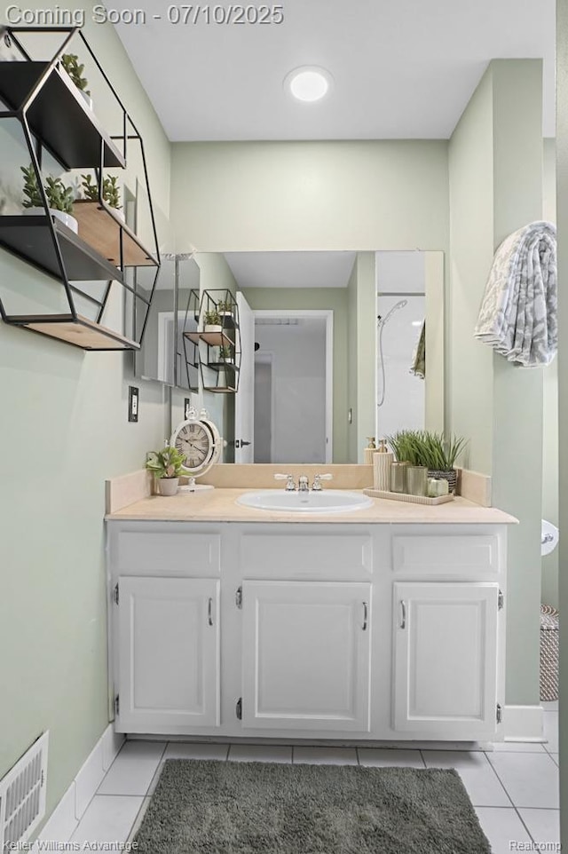 9157 Hackberry Ave, Plymouth, MI 48170 - bathroom with tile patterned floors and vanity
