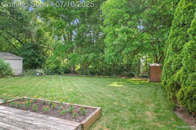 9157 Hackberry Ave, Plymouth, MI 48170 - view of yard featuring a vegetable garden