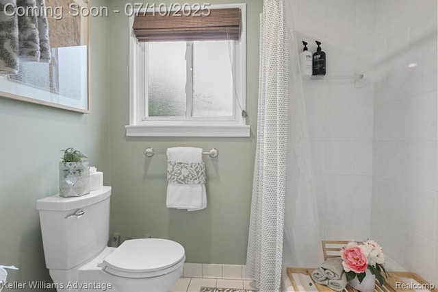 9157 Hackberry Ave, Plymouth, MI 48170 - bathroom with a tile shower and tile patterned floors
