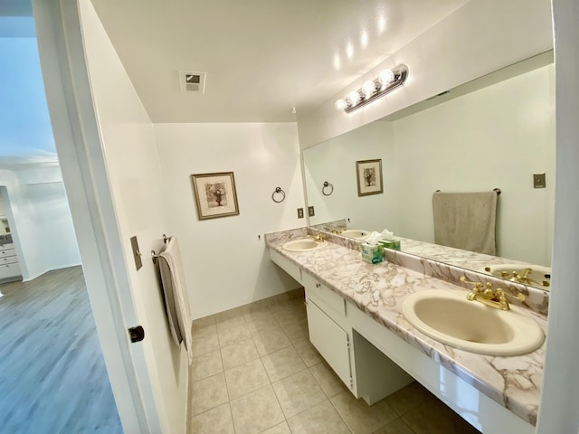 18220 University Park Dr, Livonia, MI 48152 - bathroom featuring double vanity and tile patterned floors
