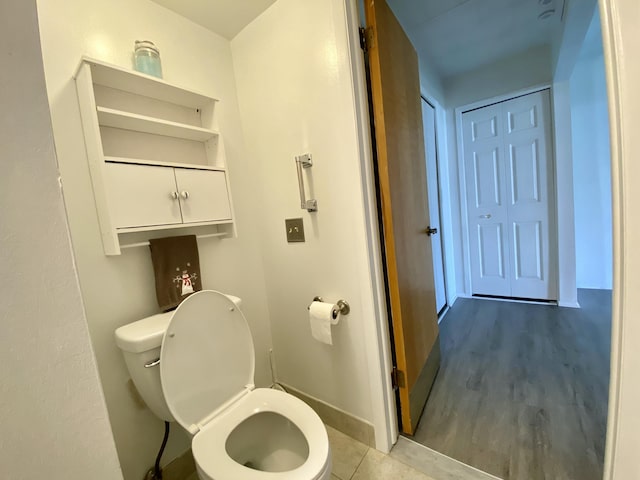 18220 University Park Dr, Livonia, MI 48152 - bathroom with toilet and wood finished floors