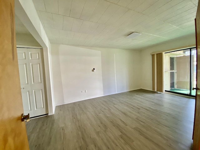 18220 University Park Dr, Livonia, MI 48152 - empty room with wood finished floors