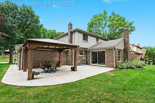 42369 Crestview Cir, Northville, MI 48168 - rear view of property with a chimney, a gazebo, a yard, and a patio