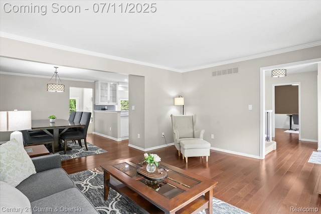 42369 Crestview Cir, Northville, MI 48168 - living room featuring wood finished floors and crown molding