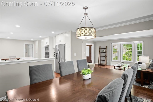 42369 Crestview Cir, Northville, MI 48168 - dining area featuring wood finished floors, crown molding, and recessed lighting
