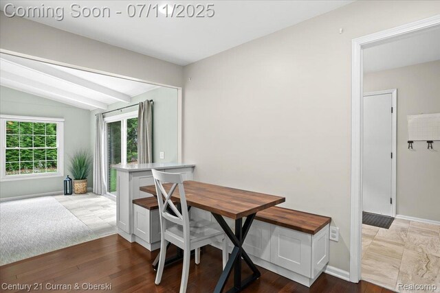 42369 Crestview Cir, Northville, MI 48168 - dining area with lofted ceiling and wood finished floors
