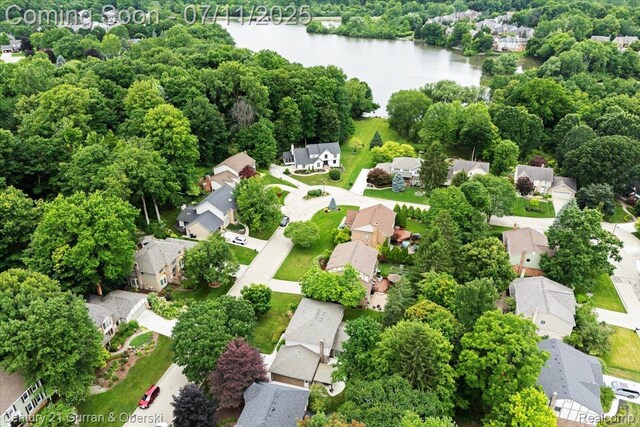 42369 Crestview Cir, Northville, MI 48168 - aerial view of residential area featuring a nearby body of water