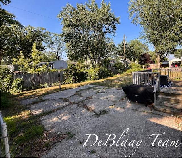 1056 Sherwood Rd, Muskegon, MI 49441 - view of patio with a deck