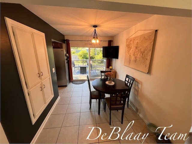 1056 Sherwood Rd, Muskegon, MI 49441 - dining area with light tile patterned floors