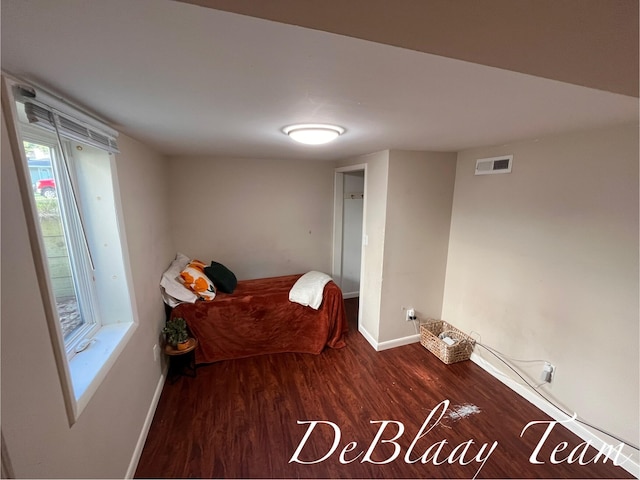 1056 Sherwood Rd, Muskegon, MI 49441 - bedroom with wood finished floors