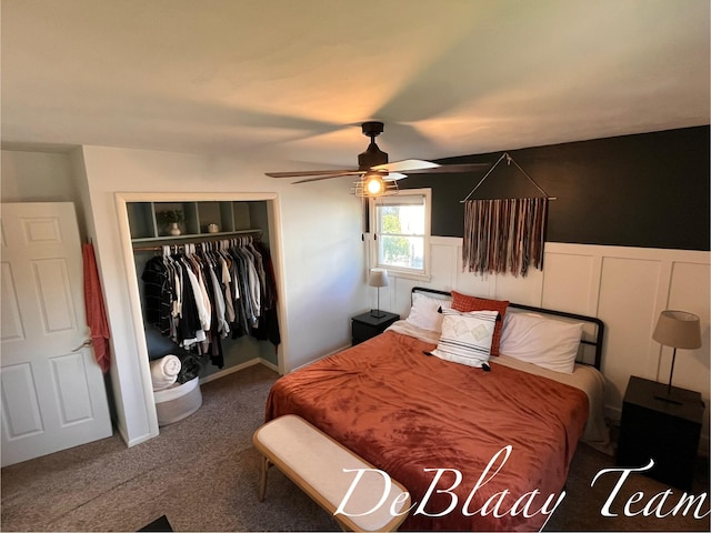 1056 Sherwood Rd, Muskegon, MI 49441 - bedroom with a closet, carpet flooring, wainscoting, and a ceiling fan