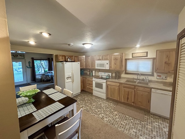 4111 E Joy Rd, Shelbyville, MI 49344 - kitchen featuring white appliances, light countertops, and light brown cabinets