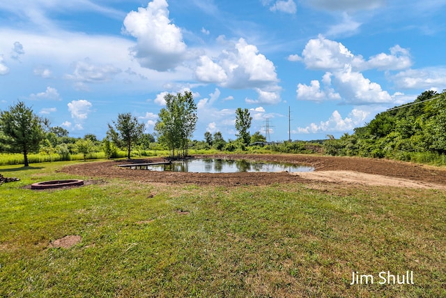 8201 Crocker Rd, Holton, MI 49425 - view of grassy yard with a water view