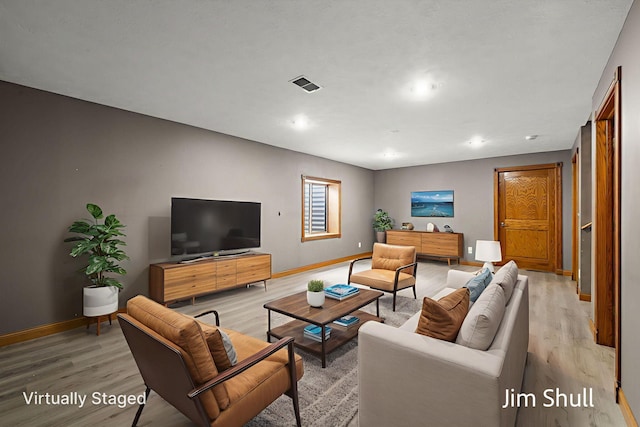 8201 Crocker Rd, Holton, MI 49425 - living room with light wood finished floors and recessed lighting