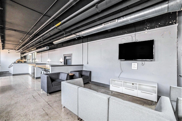 600 Broadway Ave NW Unit 402, Grand Rapids, MI 49504 - living area with baseboards and concrete floors