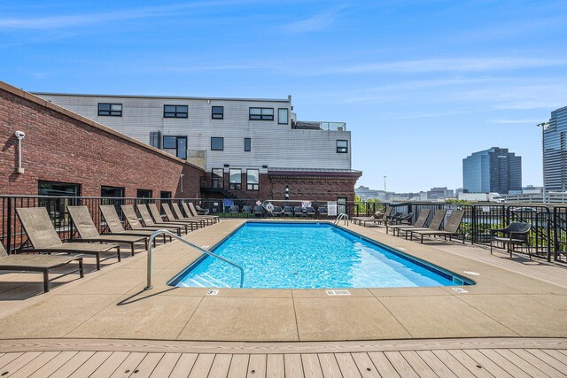 600 Broadway Ave NW Unit 402, Grand Rapids, MI 49504 - community pool with a patio area