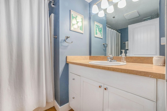600 Broadway Ave NW Unit 402, Grand Rapids, MI 49504 - full bathroom featuring vanity and a shower with shower curtain