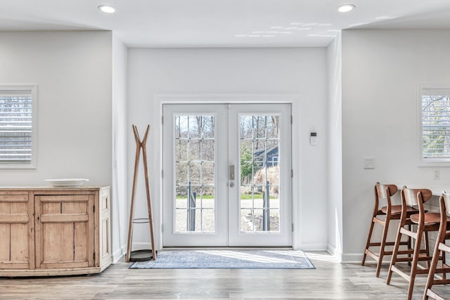 32 Walden Way, New Buffalo, MI 49117 - entryway featuring french doors, wood finished floors, and recessed lighting