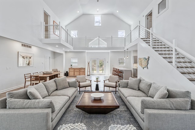 32 Walden Way, New Buffalo, MI 49117 - living room featuring stairs, high vaulted ceiling, and recessed lighting