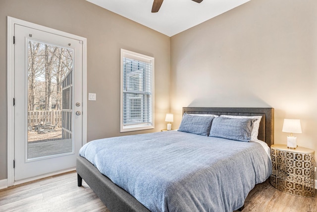 32 Walden Way, New Buffalo, MI 49117 - bedroom featuring wood finished floors, access to outside, and ceiling fan