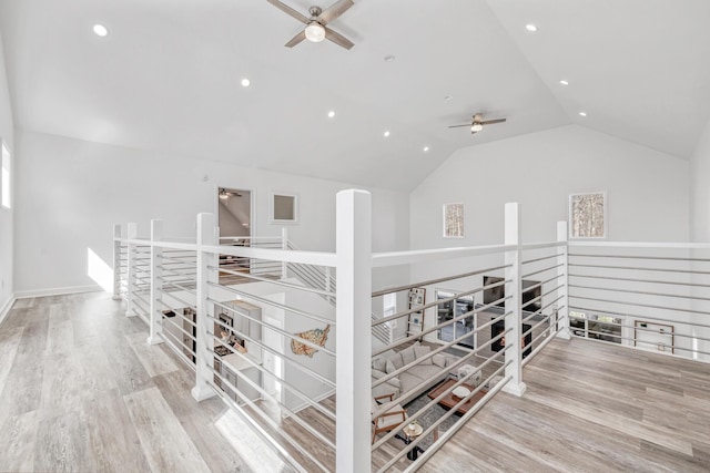 32 Walden Way, New Buffalo, MI 49117 - hall with lofted ceiling, wood finished floors, an upstairs landing, and recessed lighting