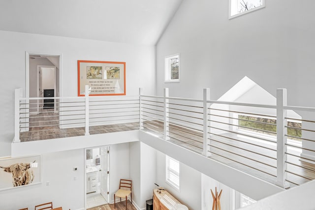 32 Walden Way, New Buffalo, MI 49117 - staircase featuring high vaulted ceiling and wood finished floors