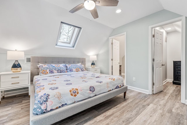 32 Walden Way, New Buffalo, MI 49117 - bedroom featuring lofted ceiling, light wood-style flooring, a skylight, recessed lighting, and a ceiling fan